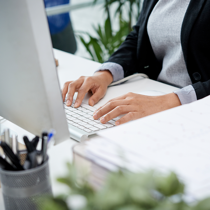 Hands on a keyboard.