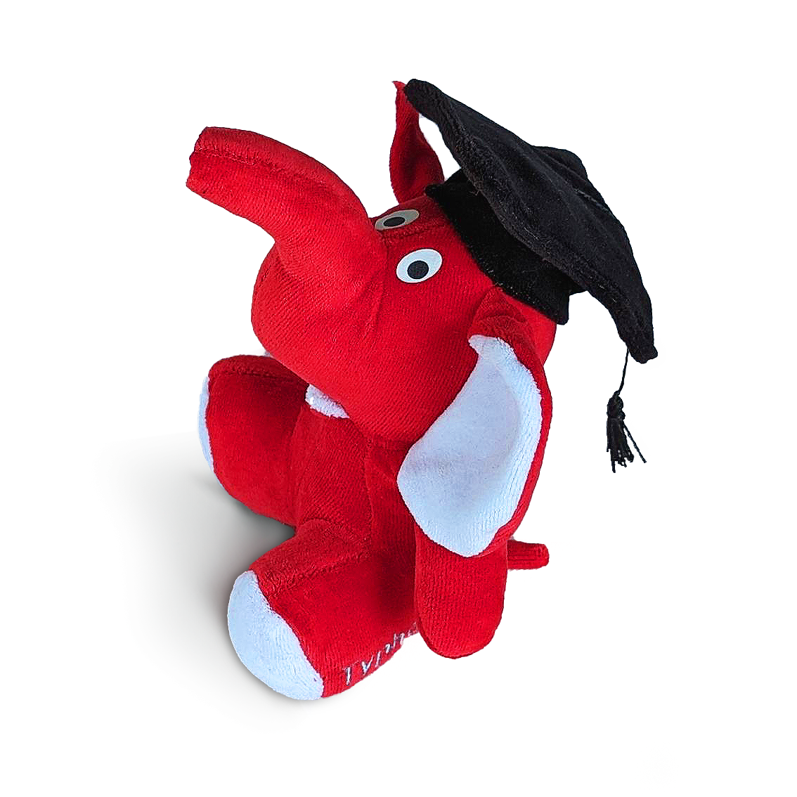 HIL Academy's mascot - a stuffed red elephant with a graduation cap.