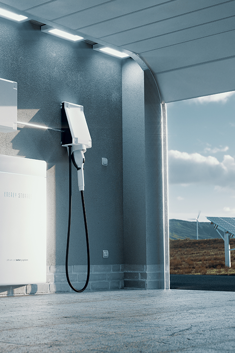 View from the garage with electric vehicle charger, and through the open door you can see the wind turbine and solar panel.